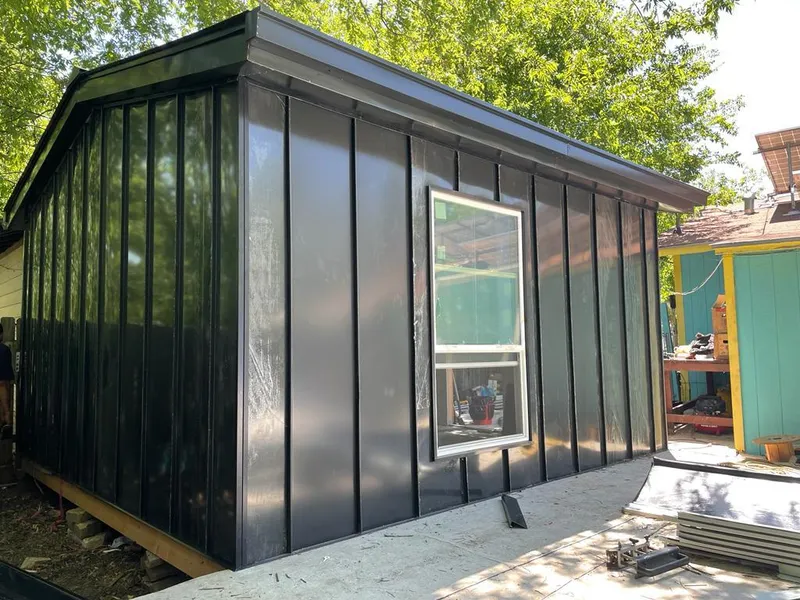 Black standing seam metal wall panels for Metal Roof Installation in Merrimac