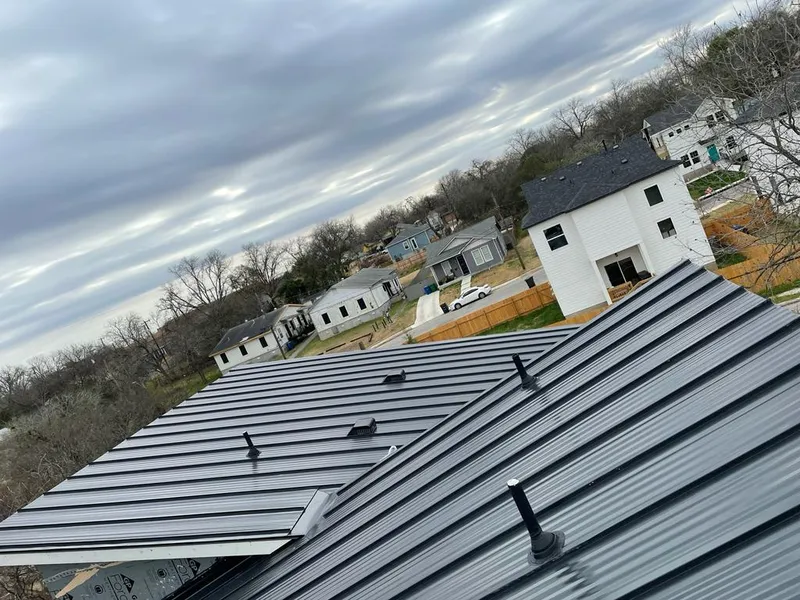 Standing seam metal roof panels with vents for Skylight Repair in Merrimac